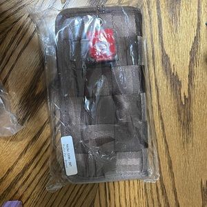 New in bag never used brown seatbelt wallet